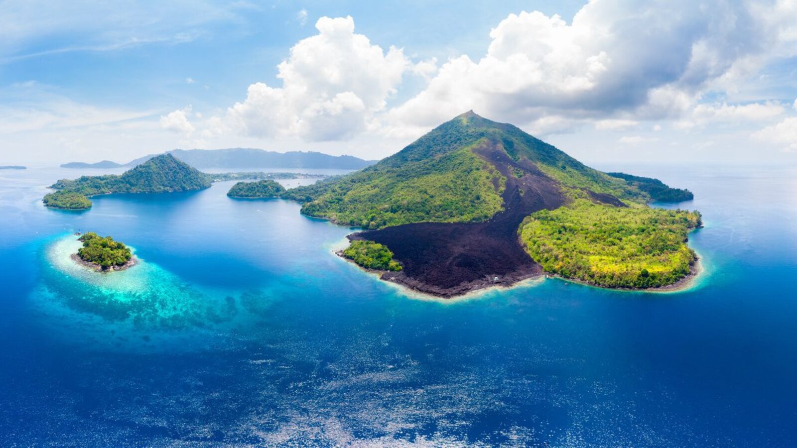 Wide aerial view of the Banda Islands volcanic archipelago, Indonesia