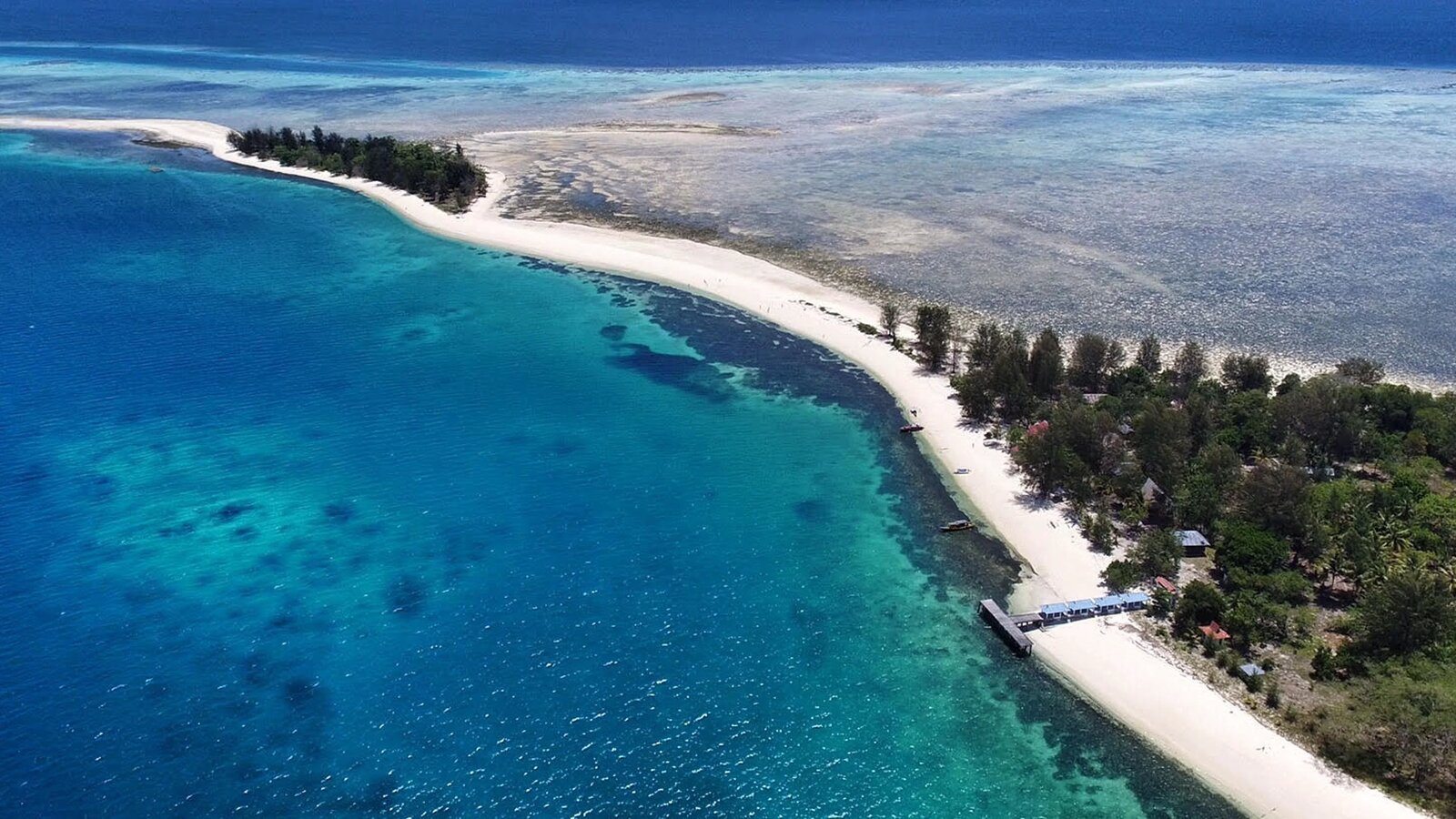 Aerial view of a reef shelf and jetty, Halmahera, Indonesia