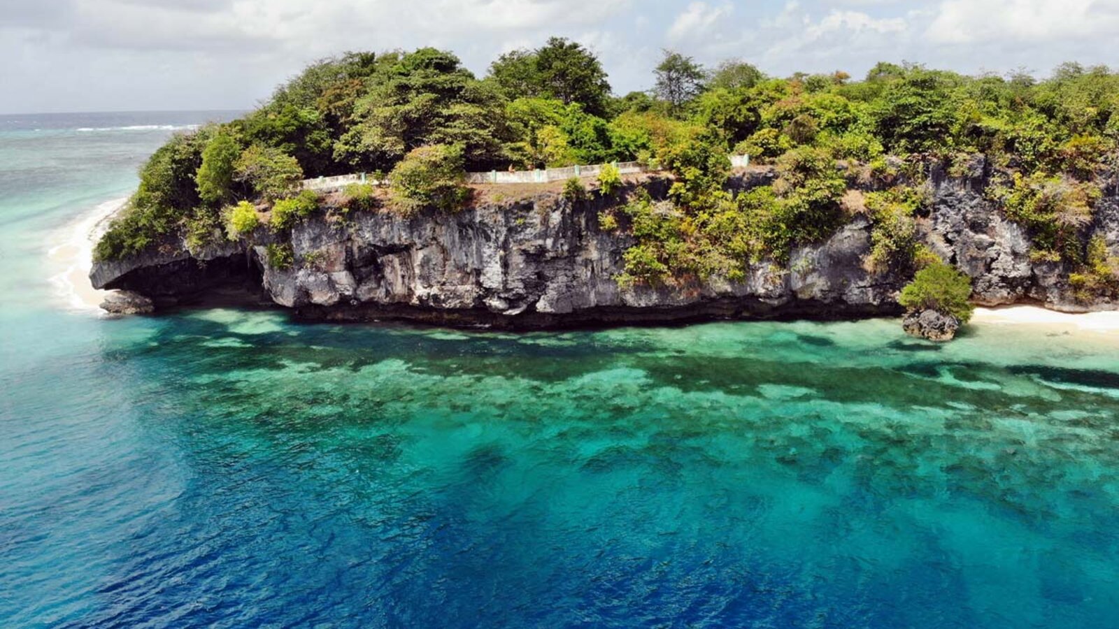Limestone cliff and reef shallows, Wakatobi, Indonesia